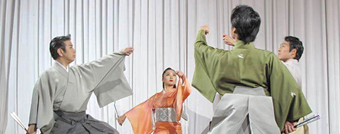 An ensemble of dancers in montsuki-hakama